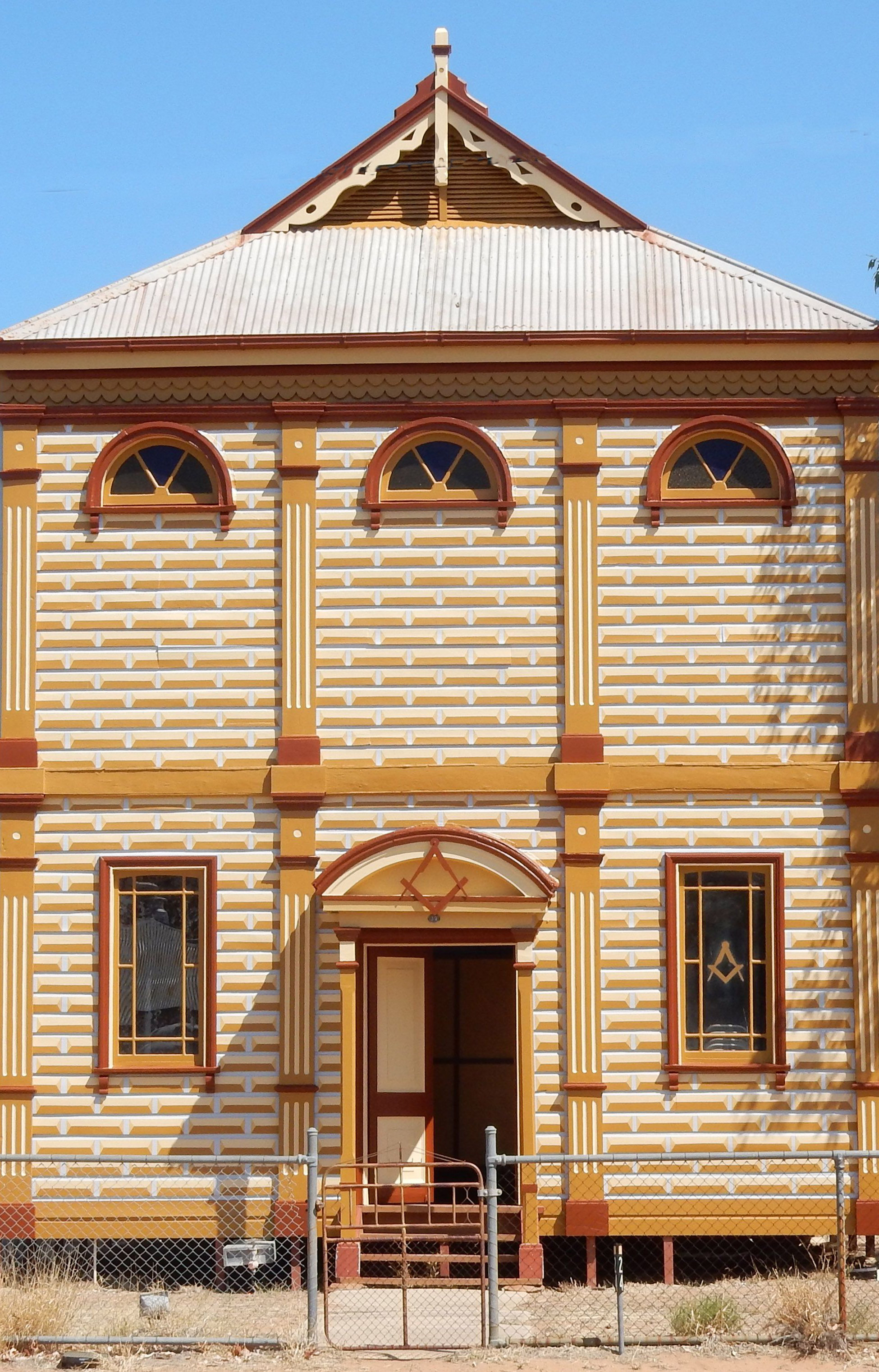 The Barcaldine Masonic Temple - painted mock stonework on the front of a galvanised iron building is rare in Queensland